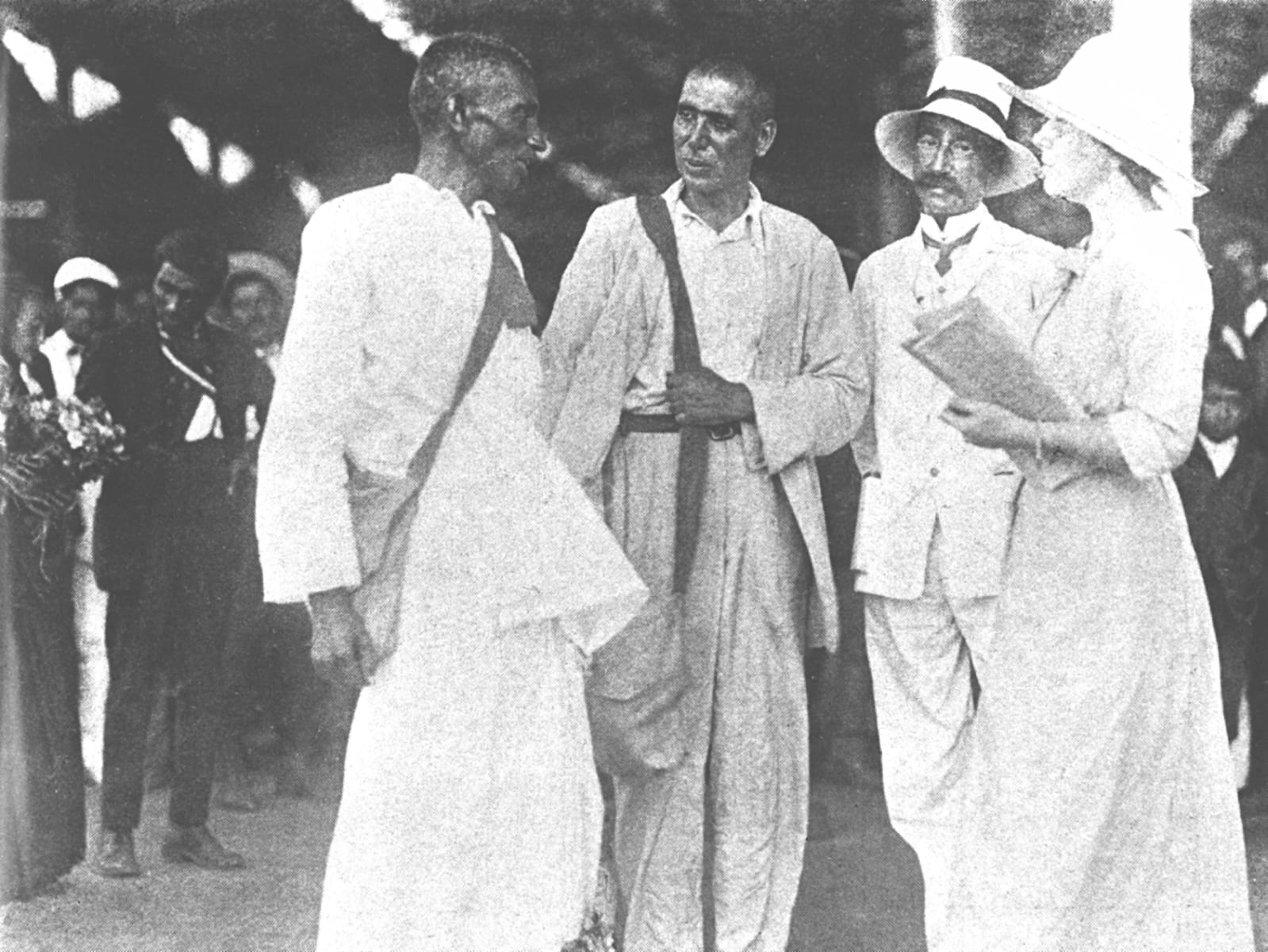 Gandhi in discussion with co-workers at Maritzburg Railway Station, South Africa, December 1913